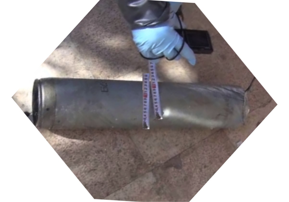 Still from the UN/OPCW inspection video with the edited measuring tape. 