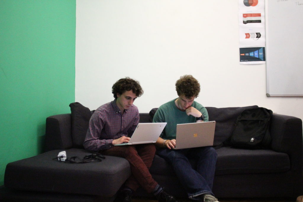 University students during verification training at First Draft. Giacomo Antonelli, 25 (left), said journalism students should have verification training. (Image: First Draft)