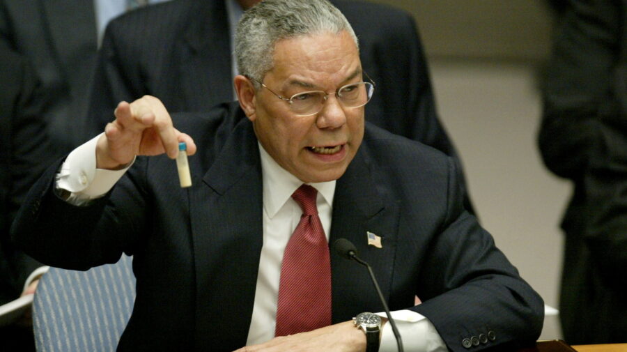 FILE PHOTO: U.S. Secretary of State Colin Powell holds up a vial that he described as one that could contain anthrax, during his presentation on [Iraq] to the U.N. Security Council, in New York February 5, 2003. REUTERS/Ray Stubblebine/File Photo